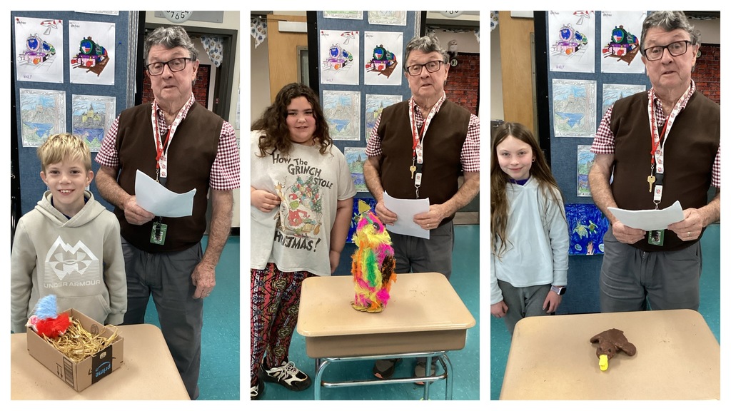 Alt text (left): A student stands beside his bird-in-a-nest project on a desk next to the teacher. Alt text (middle): A student stands with her tall rainbow-feathered bird on a desk next to the teacher. Alt text (right): A student stands with her brown bird project on a desk next to the teacher.