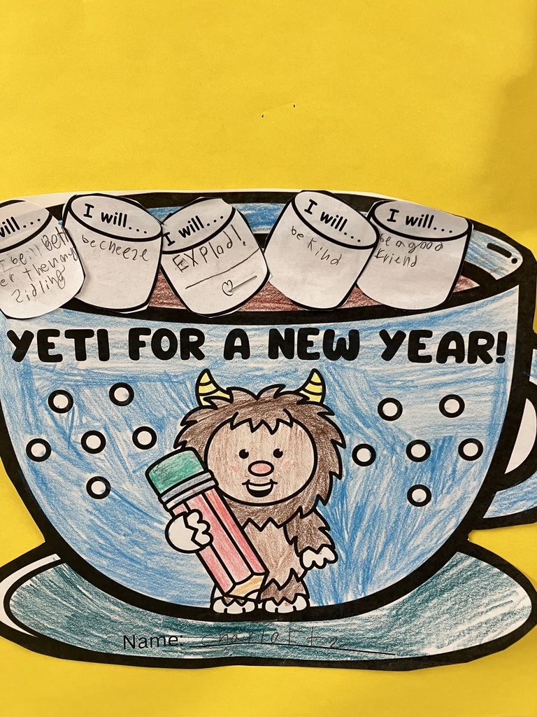  The mug is colored light blue with white polka dots and features a brown yeti holding a pencil. Five paper marshmallows are glued to the top of the hot cocoa, with handwritten resolutions including: "be better then my zibling," "be cheeze," "EXPLOD!", "be kind," and "be a good friend.