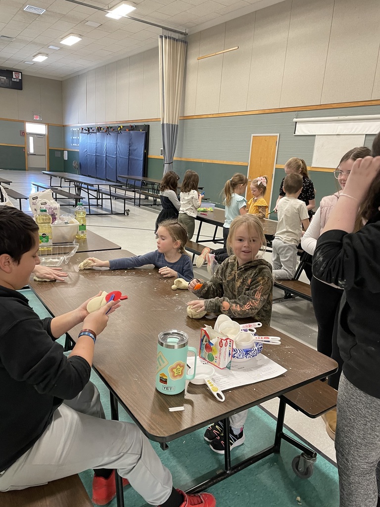These images document a collaborative "Easy No-Cook DIY Playdough" workshop held for children and teenagers in a school cafeteria or gymnasium.