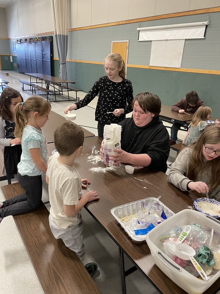 This collection of images documents a collaborative "Easy No-Cook DIY Playdough" workshop held for children and teenagers in a school cafeteria or gymnasium setting.