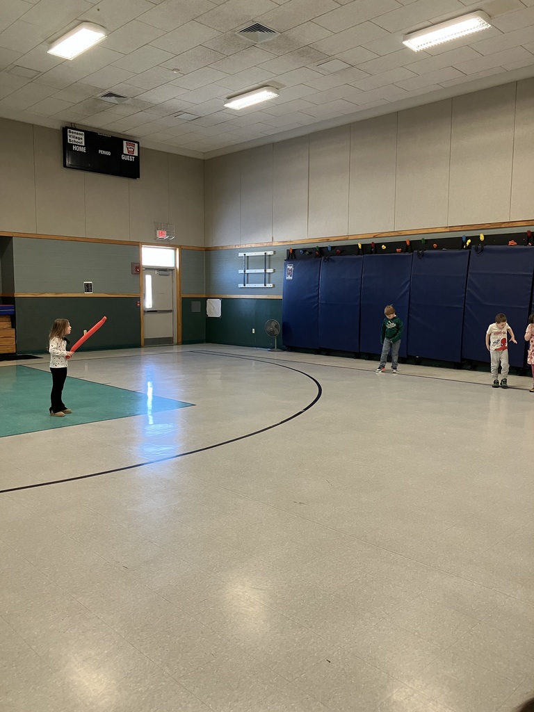 These images capture children participating in jewelry-making and physical activities within a school gymnasium