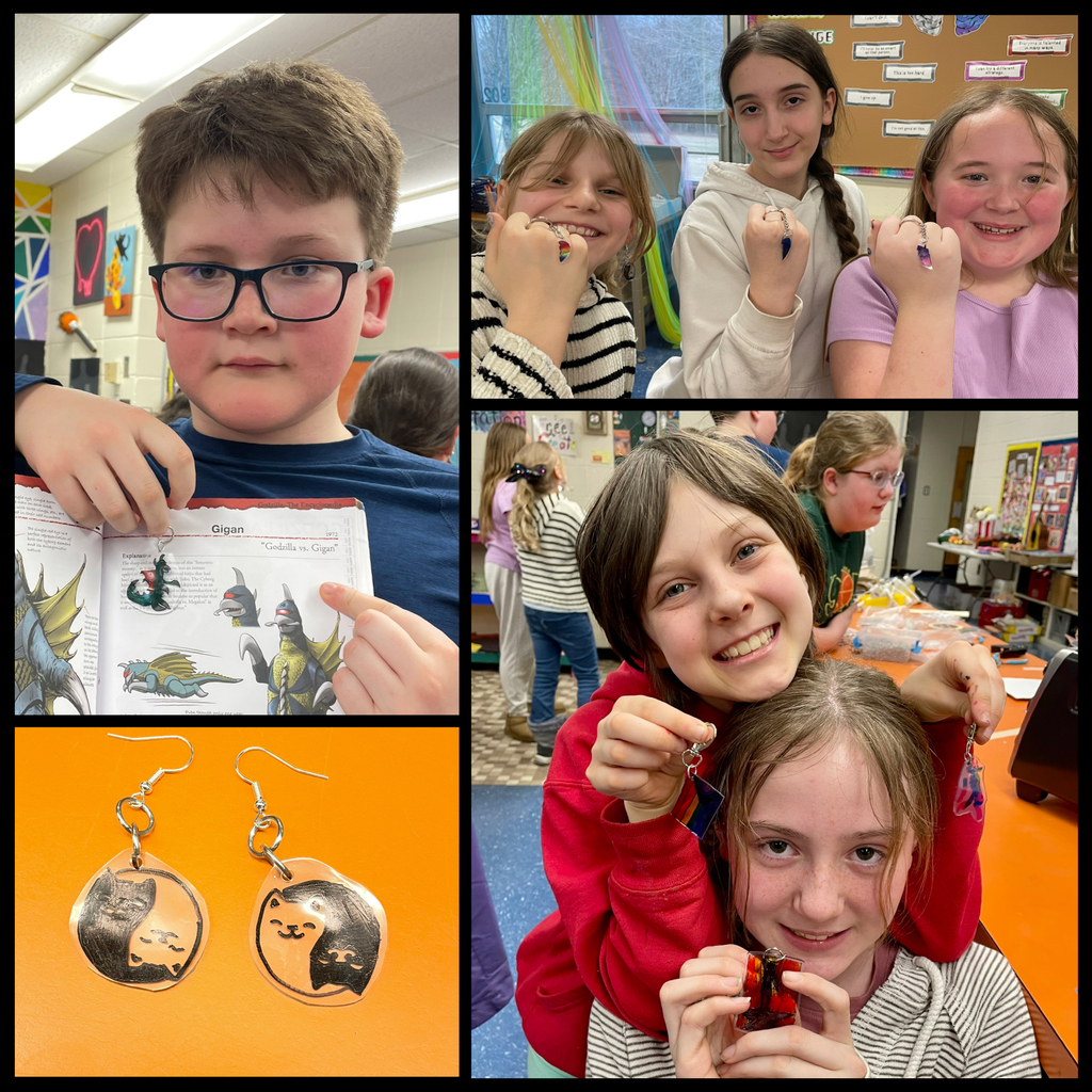 Students in an art classroom display handmade projects, including resin jewelry and keychains; one student holds a book while others smile and show their finished pieces, with a close-up of cat-shaped earrings.