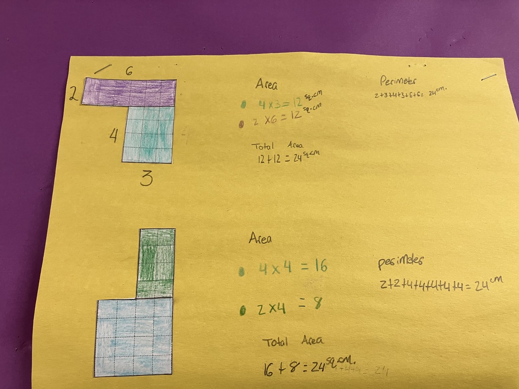 A close-up of a yellow sheet of construction paper showing two separate area and perimeter math problems. The top problem features an inverted L-shape made of a purple rectangle (6 by 2 units) on top of a teal rectangle (3 by 4 units). The handwritten work calculates the total area as "12 + 12 = 24 sq. cm" and the perimeter as "24 cm." The bottom problem shows a green rectangle stacked vertically on top of a light blue square. The student calculated the areas as 16 and 8, summing them to a "Total Area" of "16 + 8 = 24 sq. cm," alongside a perimeter calculation that also equals 24 cm. 
