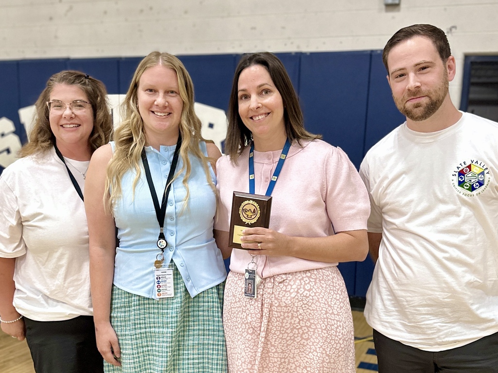 Castleton Elementary School clinicians Laura Brayton-Illinski and Emily Klee pose with their SVUUSD Executive Board Award alongside school administrators.
