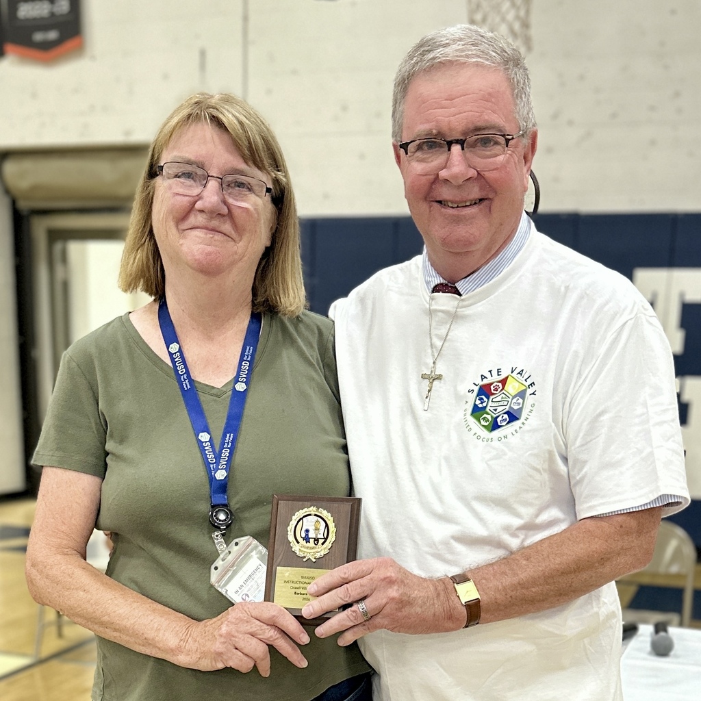 Barbara Young, OVS: Barbara Young holds her 2026 Instructional Assistant of the Year award while standing with an Orwell Village School administrator.