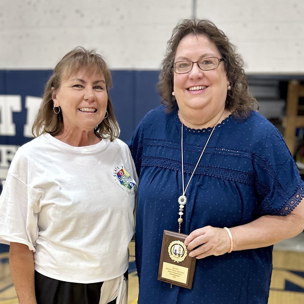 Cris Andronaco, BVS: Cris Andronaco holds her 2026 Instructional Assistant of the Year award while standing with a Slate Valley administrator.