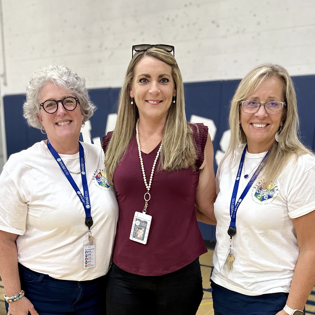 Brianna Norton, FHGS: Brianna Norton stands smiling between two Fair Haven Grade School administrators after being named 2026 Instructional Assistant of the Year.