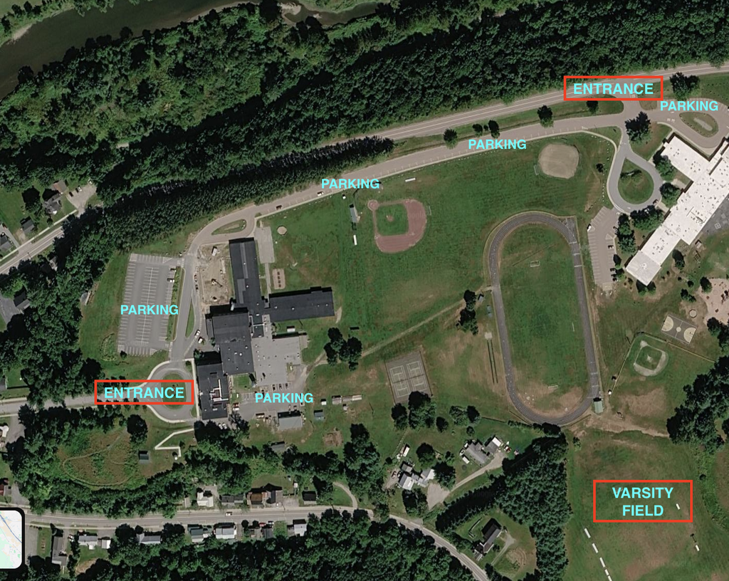 An aerial map view showing the school campus layout, parking areas, entrances, and athletic fields. Red-outlined box labels highlight "ENTRANCE" points along the access roads, designated "PARKING" lots around the school buildings and track, and the location of the "VARSITY FIELD" in the lower right corner.