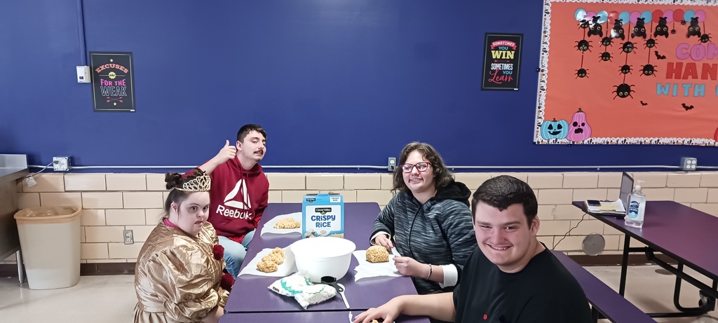 Students enjoying Rice Crispy Treats they made