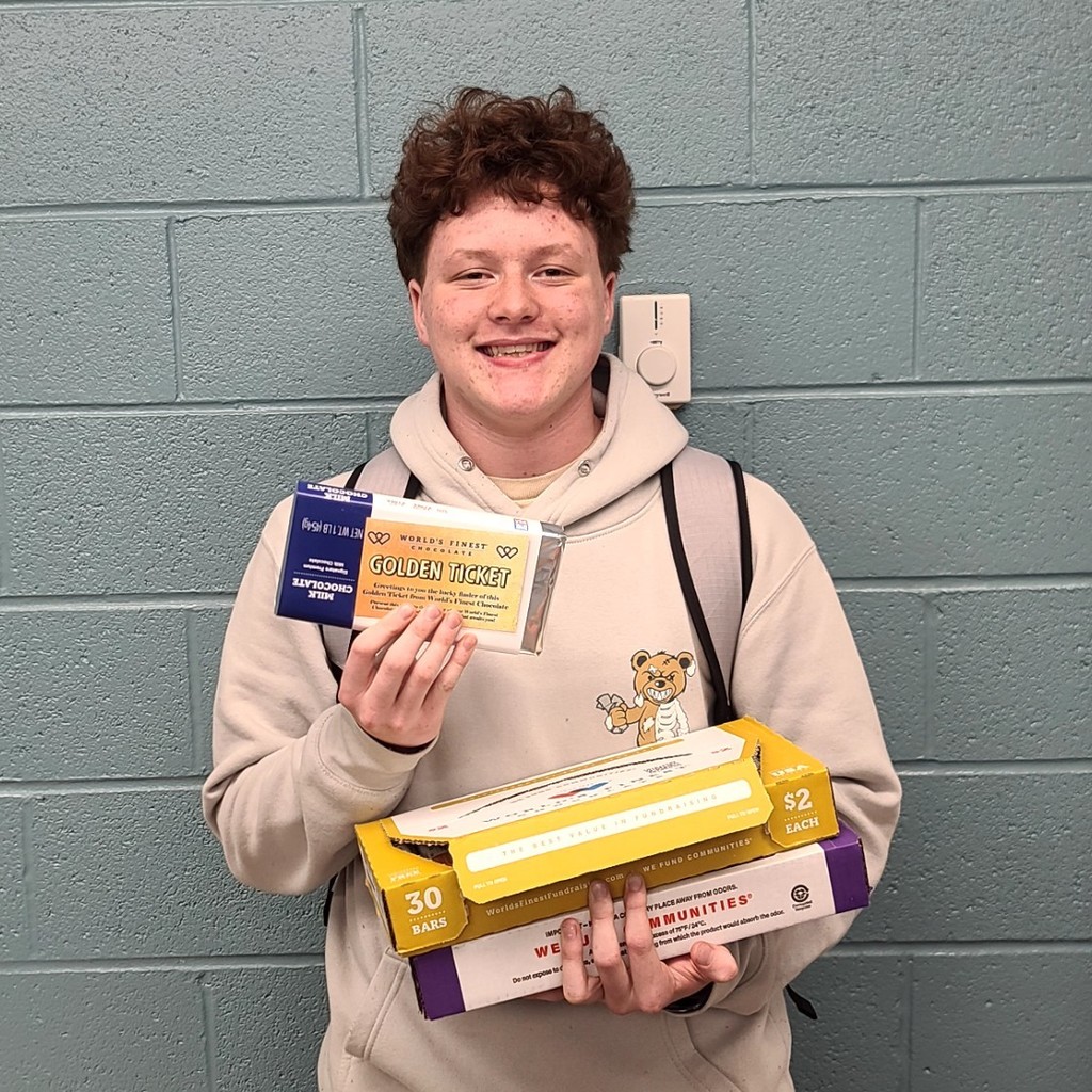 Isaiah with his golden ticket.