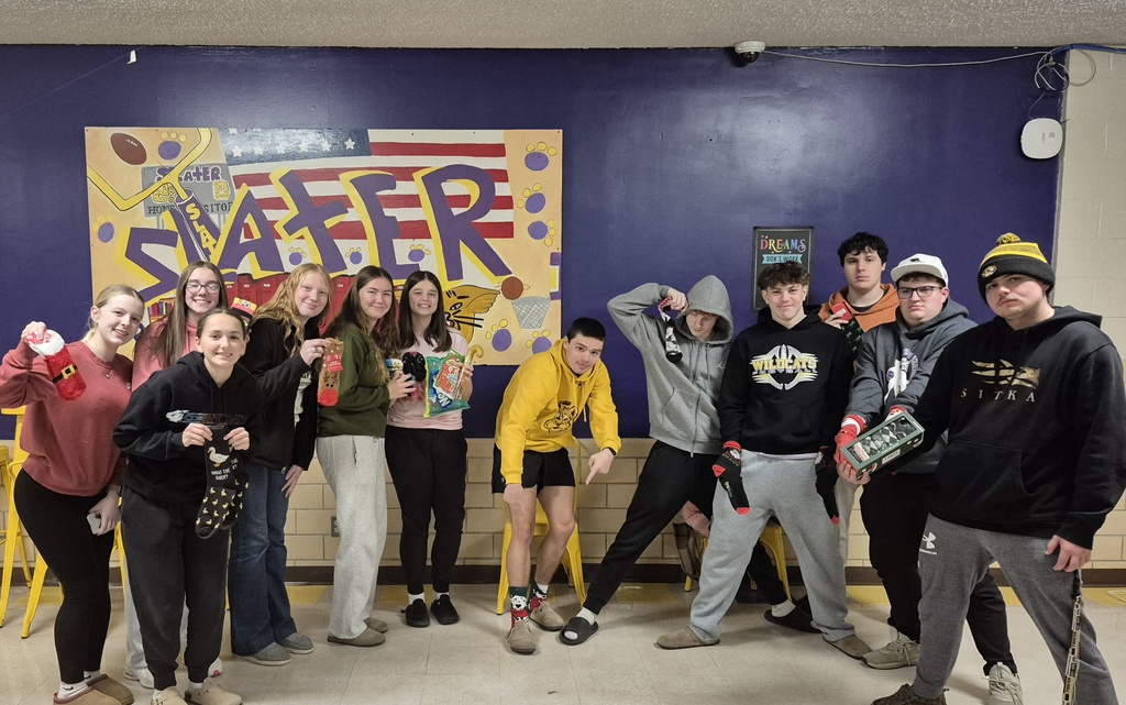 National Honor Society members met in the Cafeteria last night for their annual Christmas gathering, complete with a sock exchange, breakfast for dinner and rounds of cards. Happy Holidays from Slater NHS!