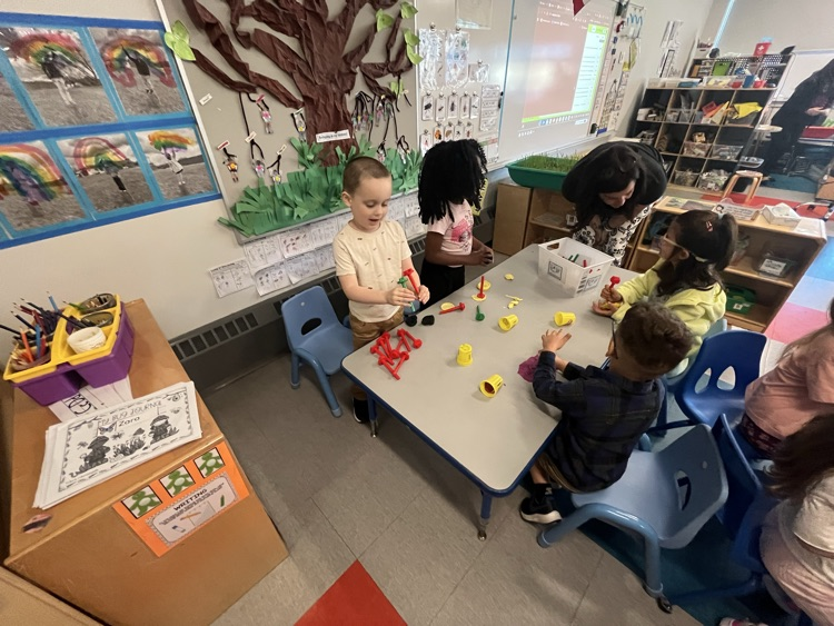 stamping letters into Play-Doh