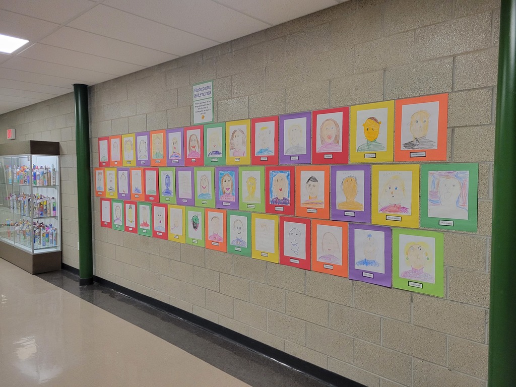8th graders kindergarten self portraits