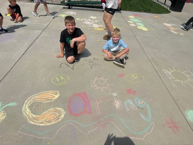 kinder & 3rd buddies - sidewalk chalk