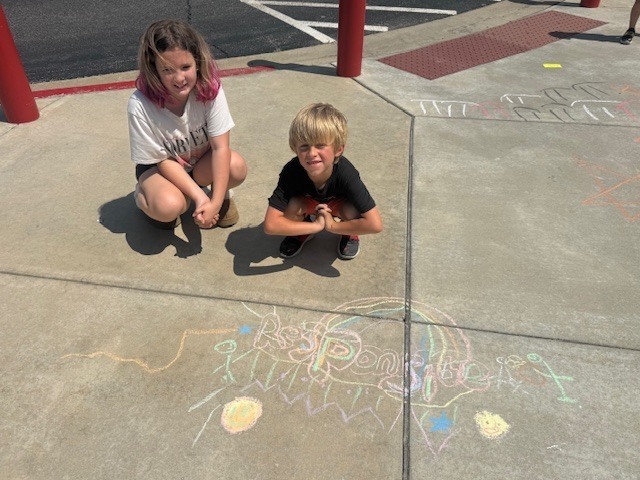 kinder & 3rd buddies - sidewalk chalk