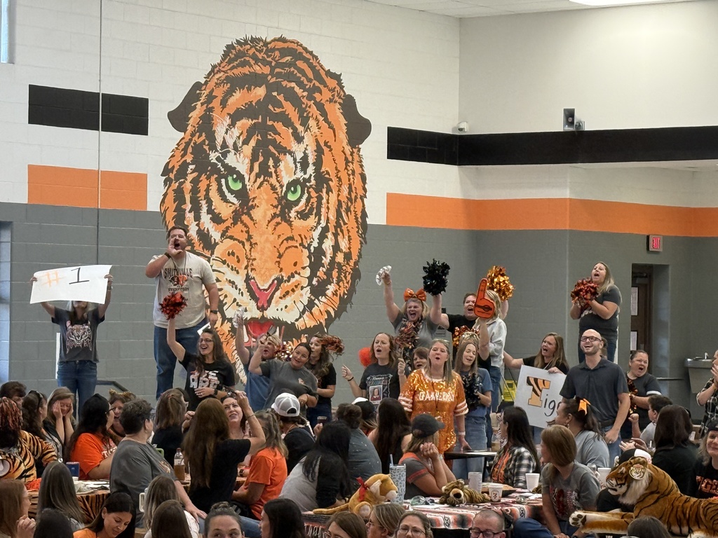 Brown primary staff cheering