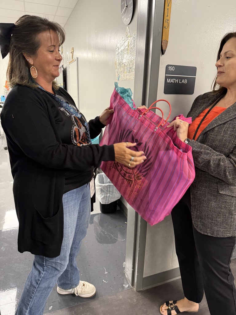 Dr. Perry handing out swag bags