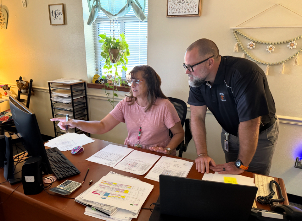 principal and teacher