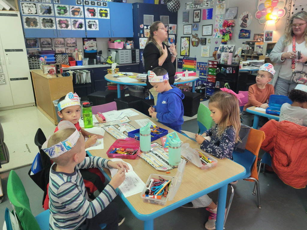 student coloring in class