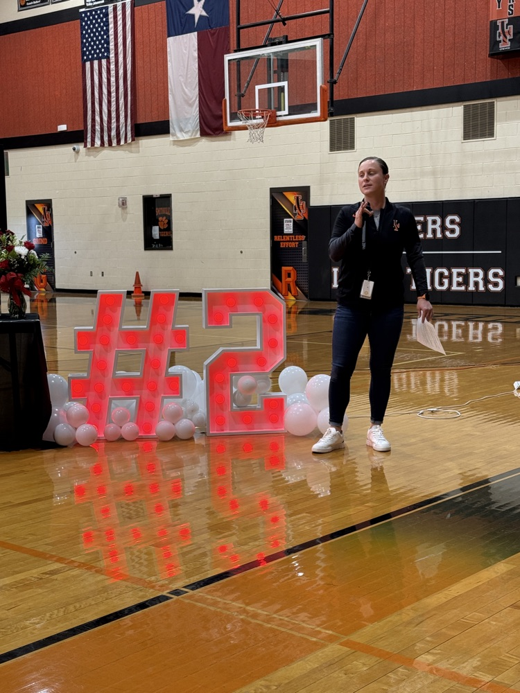 coach talking on microphone