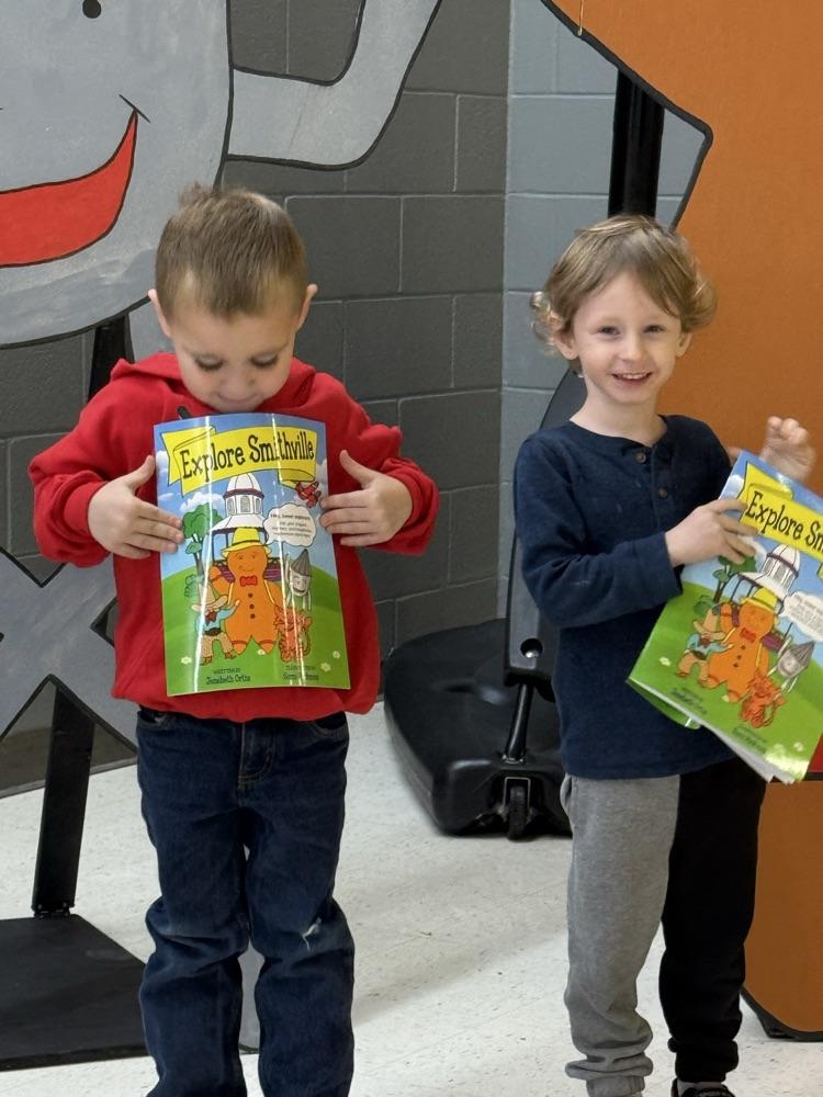 Students excited to get their very own copies of Explore Smithville Activity Book