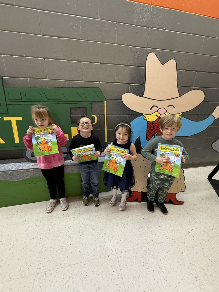 Students excited to get their very own copies of Explore Smithville Activity Book