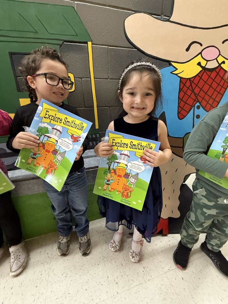 Students excited to get their very own copies of Explore Smithville Activity Book