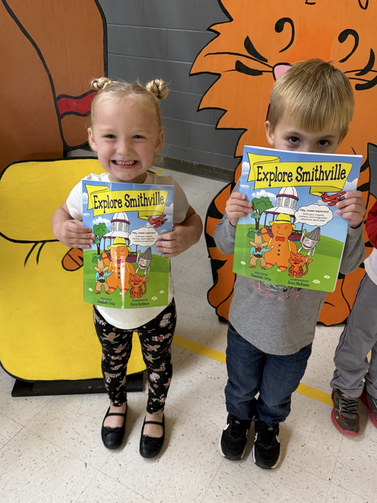 Students excited to get their very own copies of Explore Smithville Activity Book