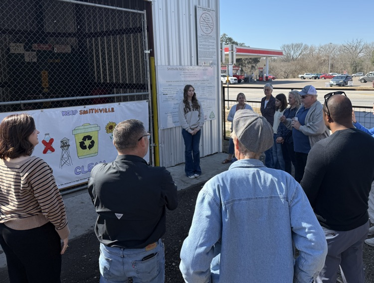 spectators listing to speaker