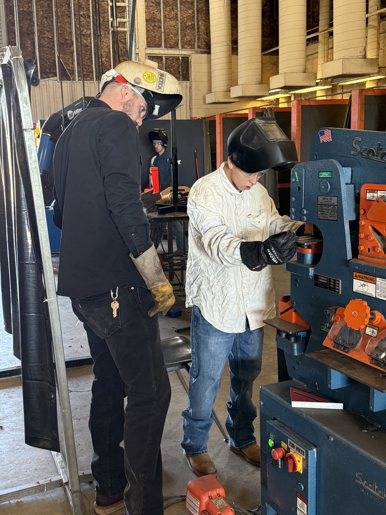 student working in metal fab shop