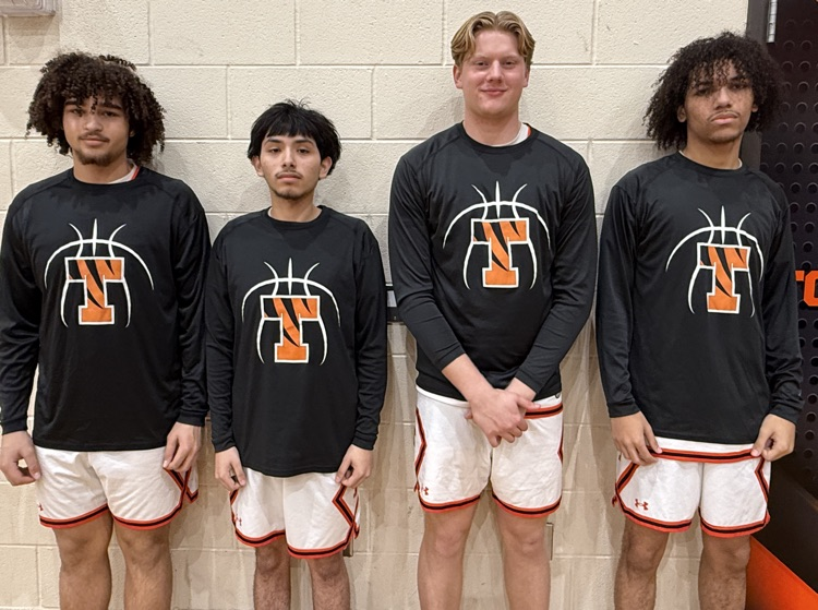 four basketball players