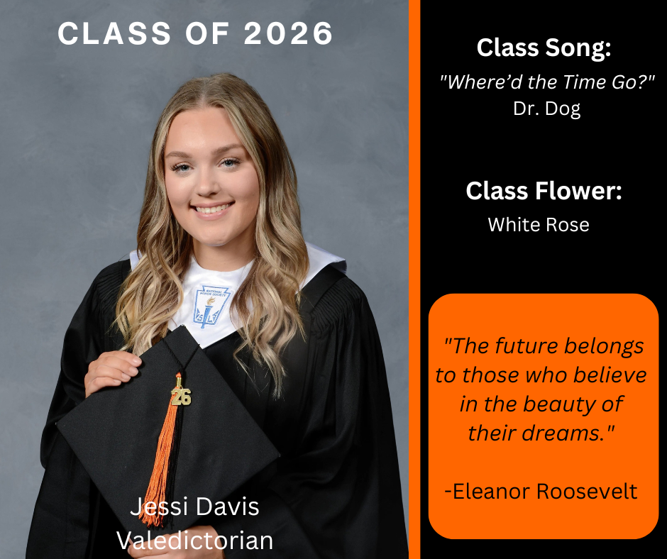 student in graduation gown, holding graduation cap
