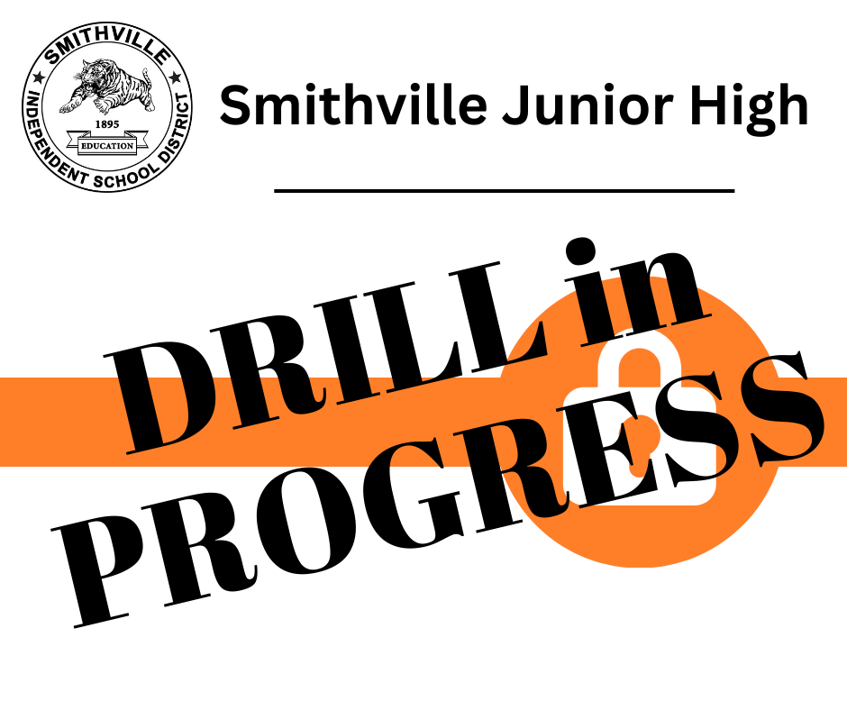 Smithville Junior High logo with the words "Drill in Progress" in bold black text and an orange lock symbol.
