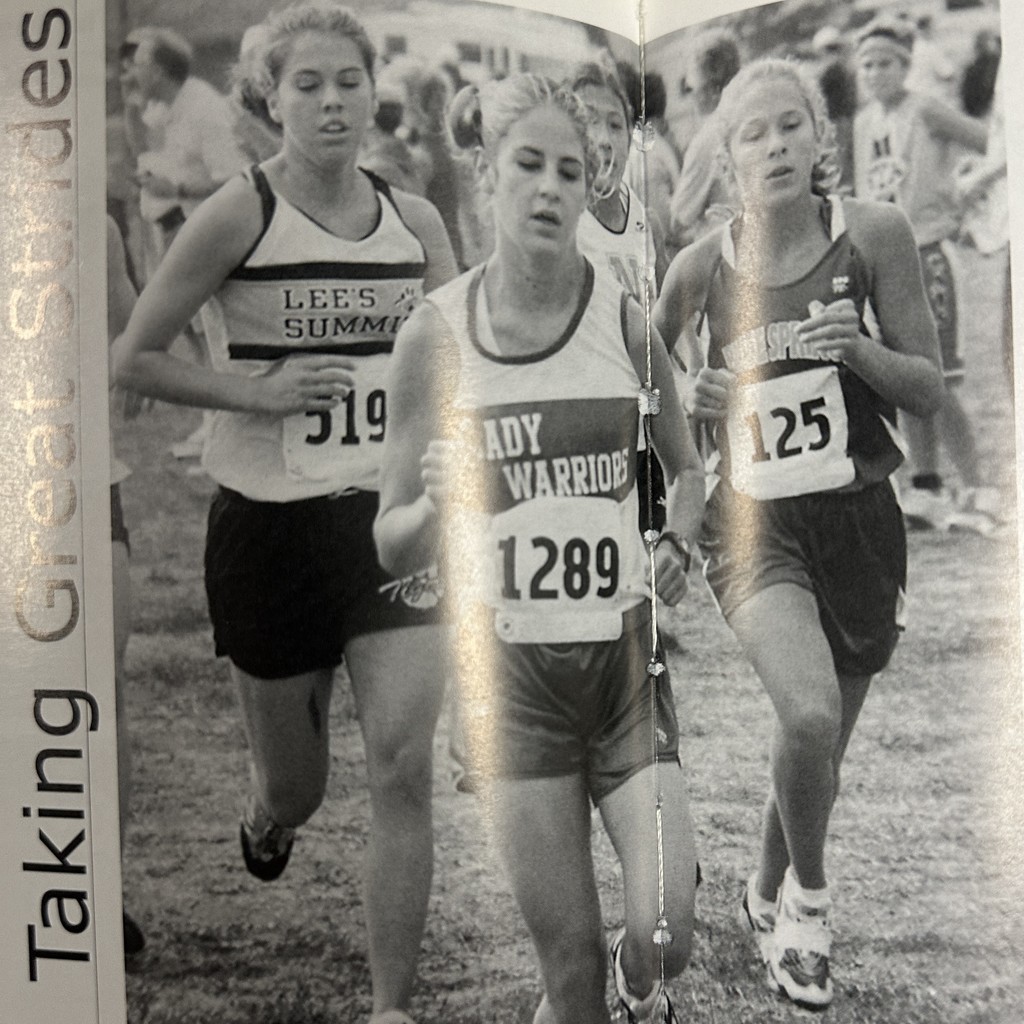 Girls running in cross country meet