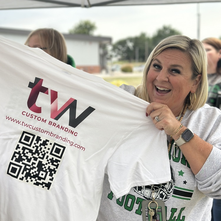 lady holding the free tshirt