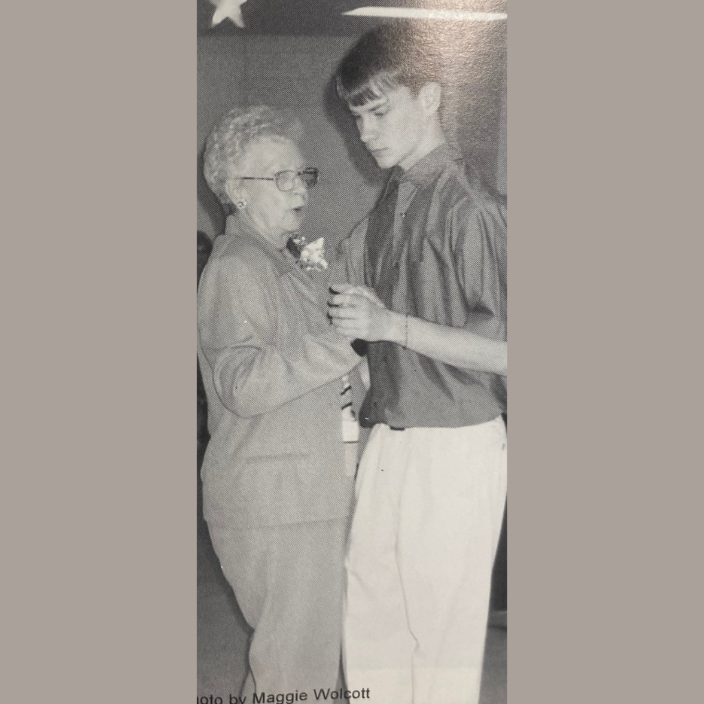 Student dances with guest at Senior Citizen Prom.