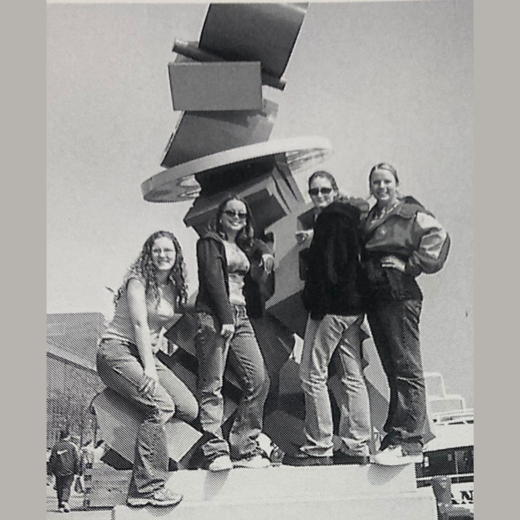 Students pose for a picture next to a statue in Chicago at the Navy Pier, 2002.