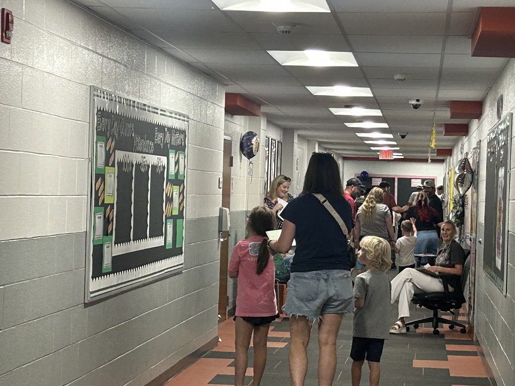 Families walking the hallways at Maple.