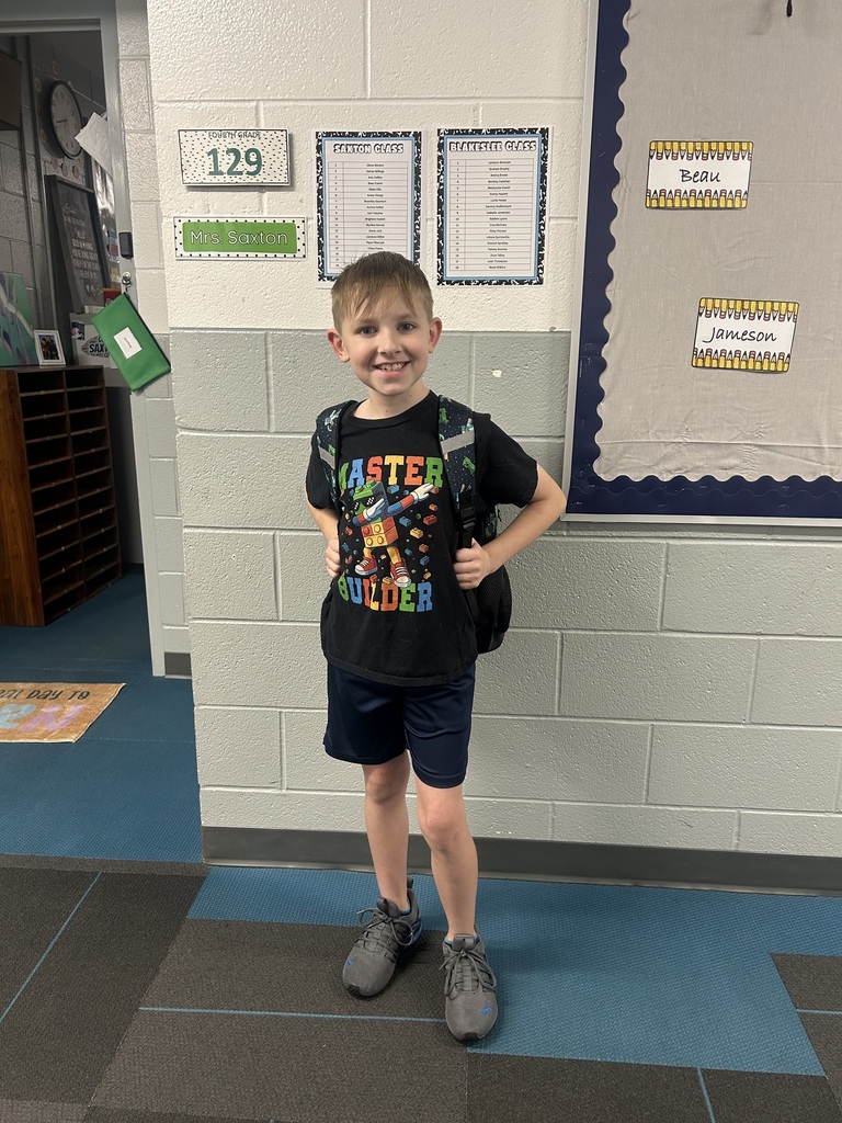 Picture of a student smiling.
