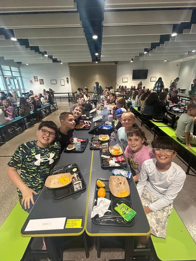 Kids eating lunch in the cafeteria