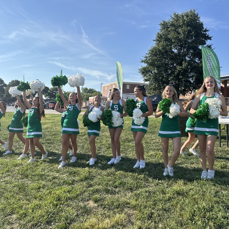 middle school cheerleaders cheering