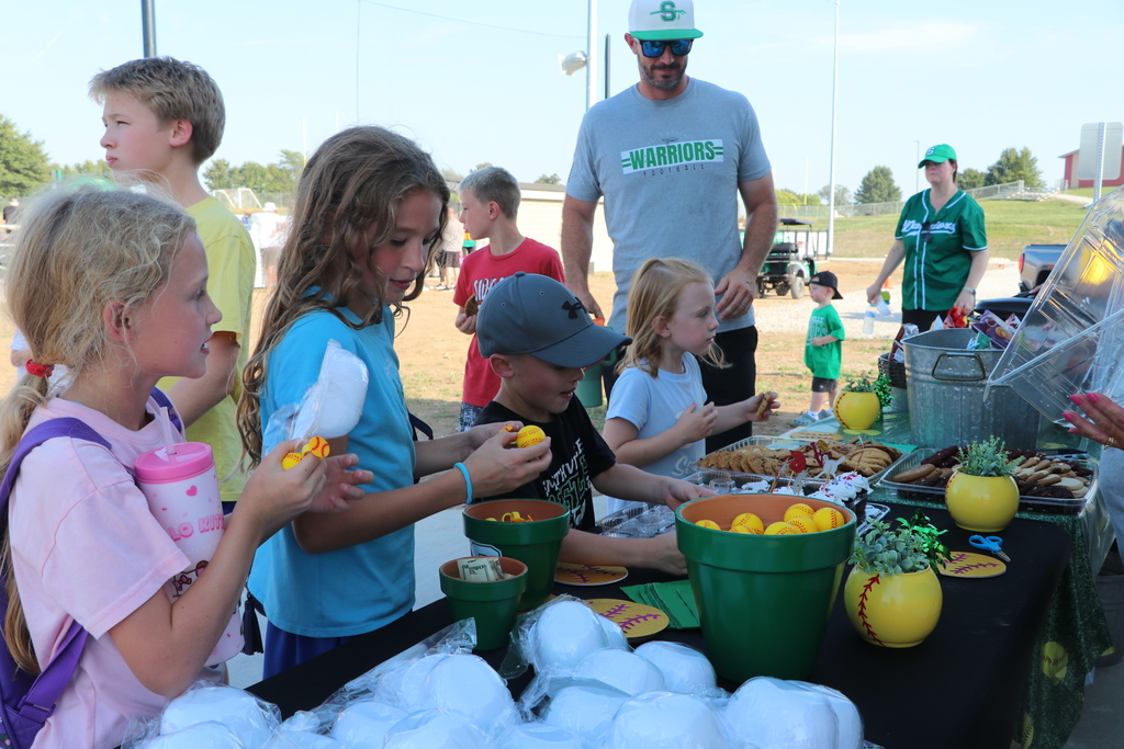 Kids get goodies from the table