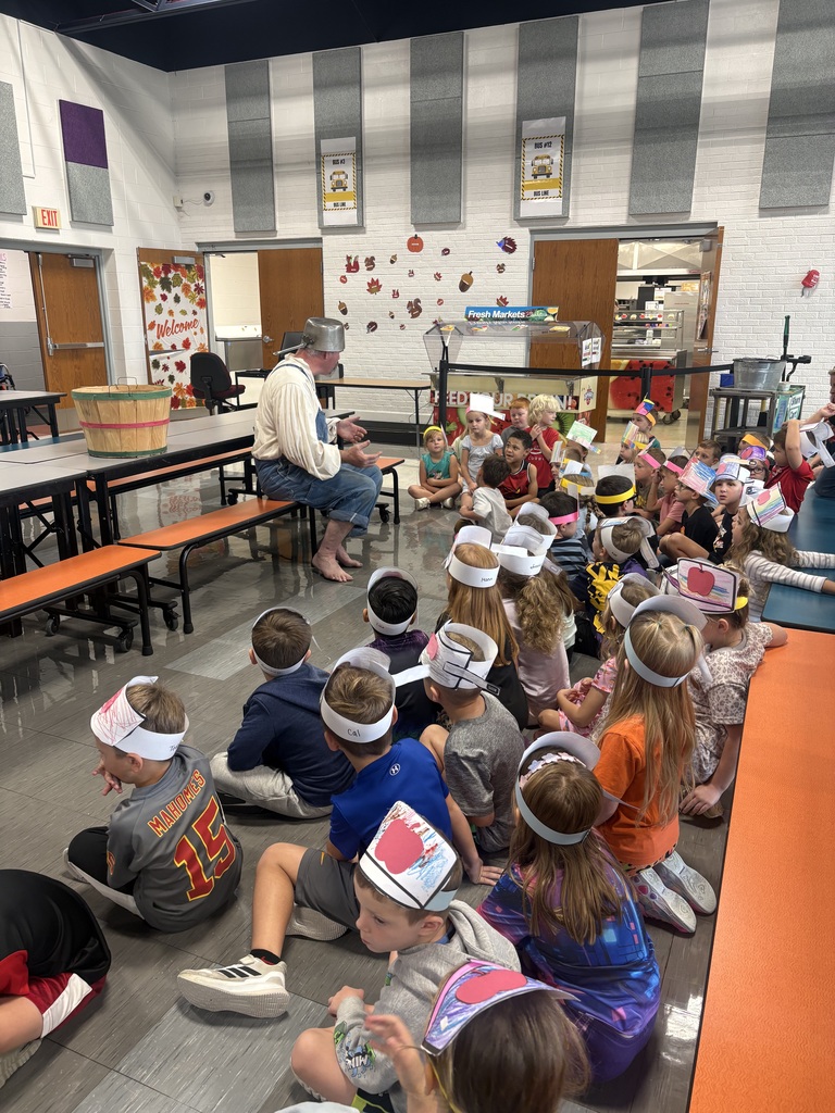 Jonny reading to students