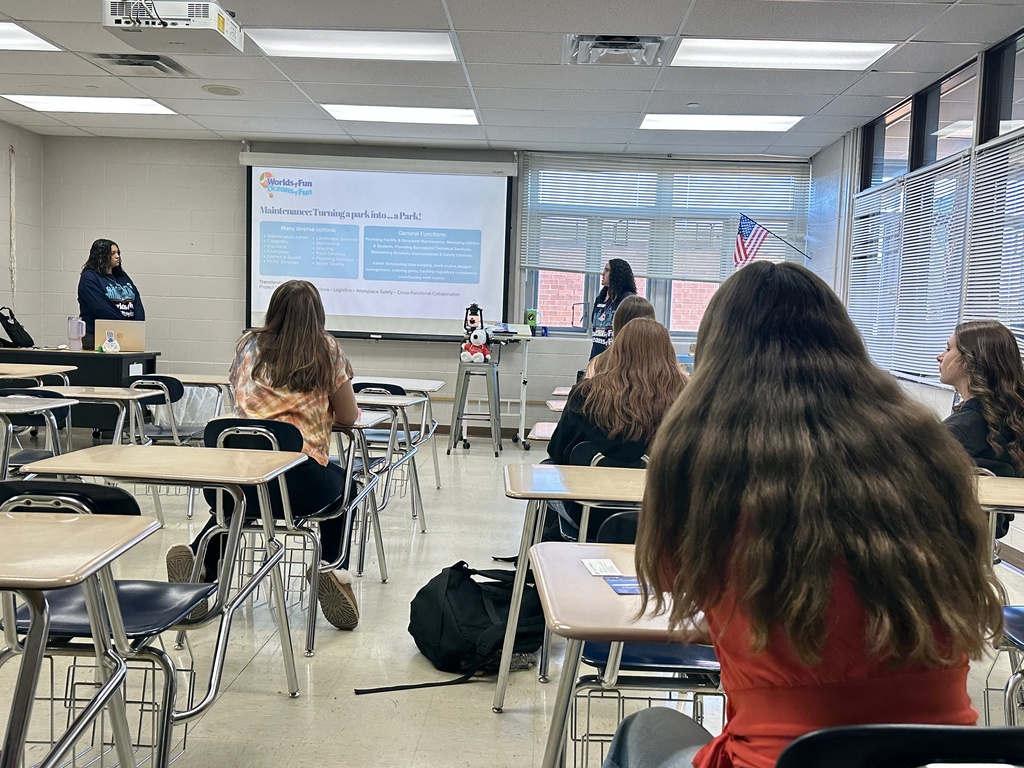 Students listen to a presentation from the recruitment team at Worlds of Fun