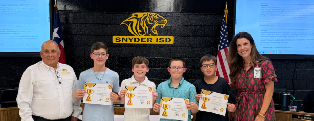 students posing with certificates