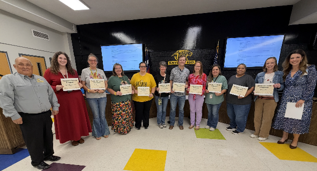 adult holding certificates