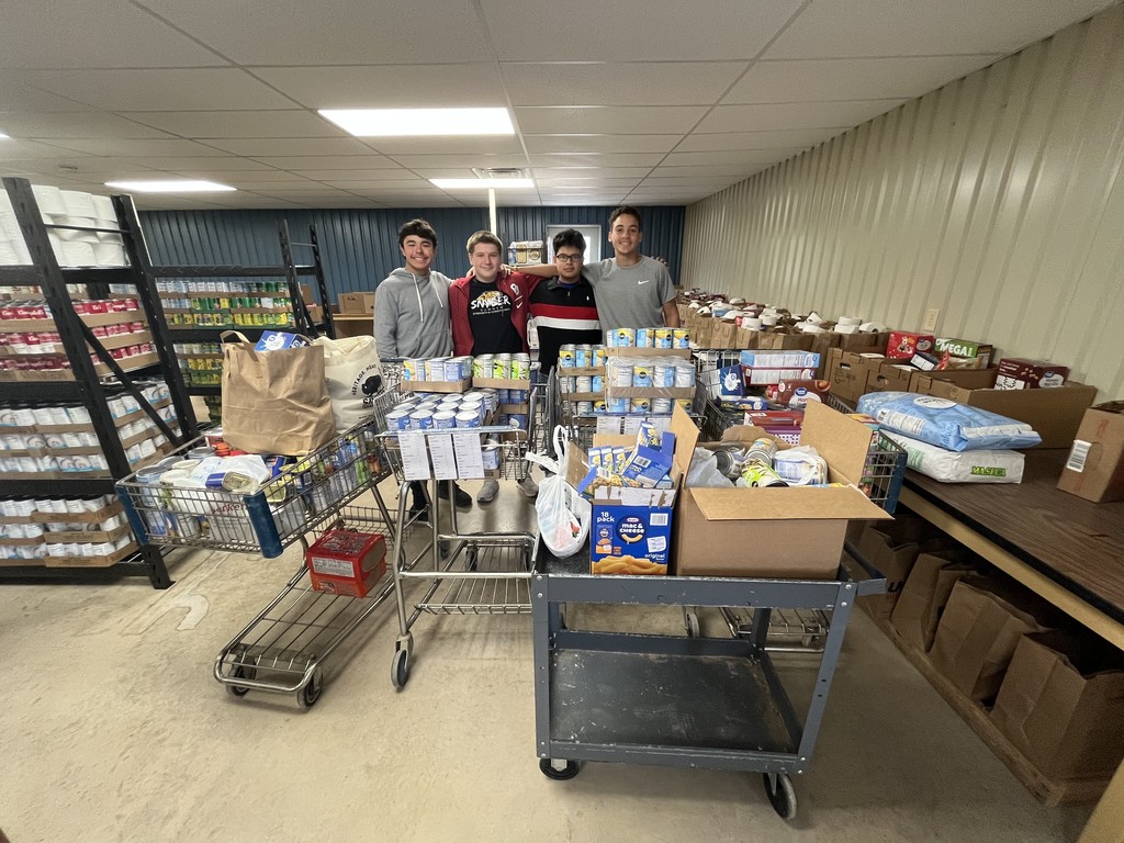 students at food cuppboard