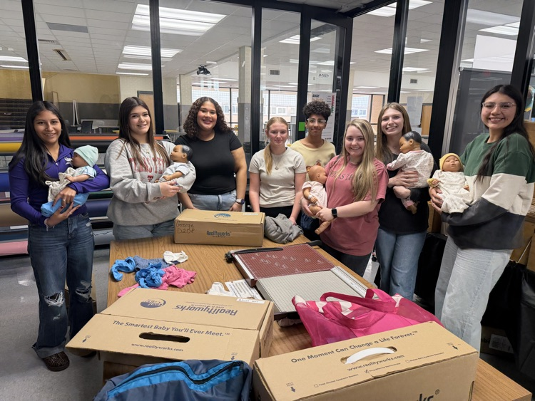 students and human growth development class posing together