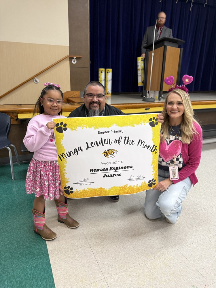 minga leader of the month posing with principal and counselor