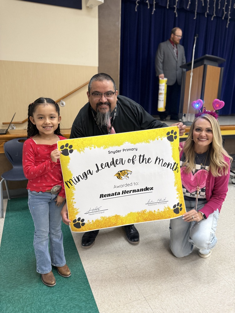 minga leader of the month posing with principal and counselor
